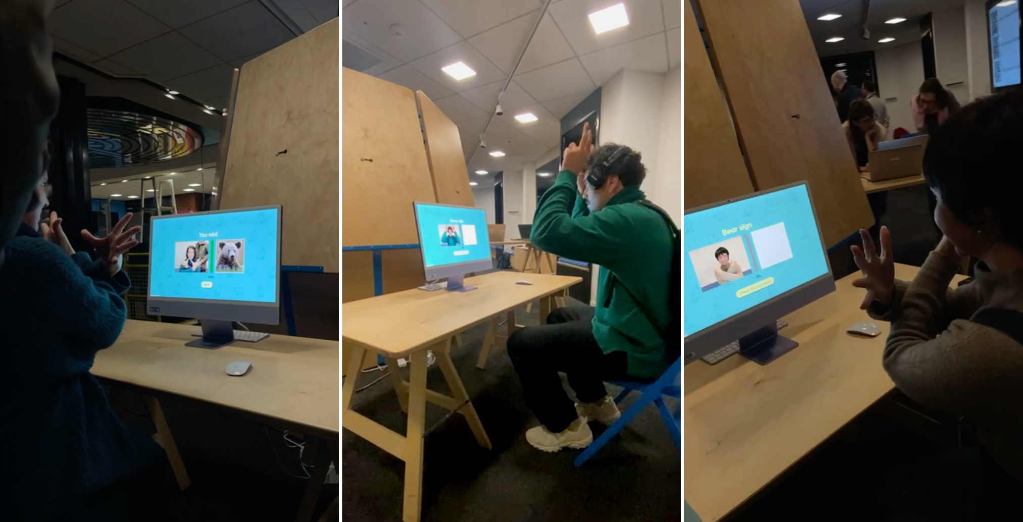 Two visitors trying the sign recognition together, one reading the instructions while the other performs the gesture