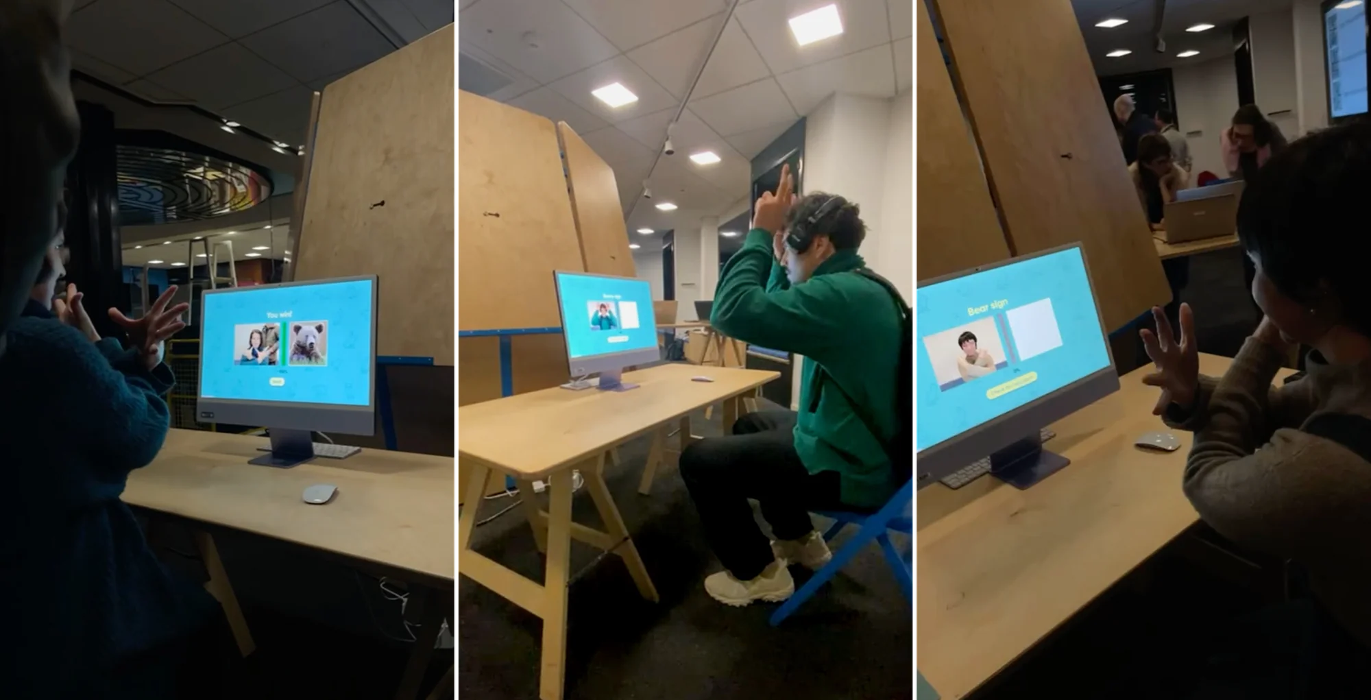 Two visitors trying the sign recognition together, one reading the instructions while the other performs the gesture
